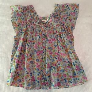 Women’s medium LoveShackFancy floral stocked top.